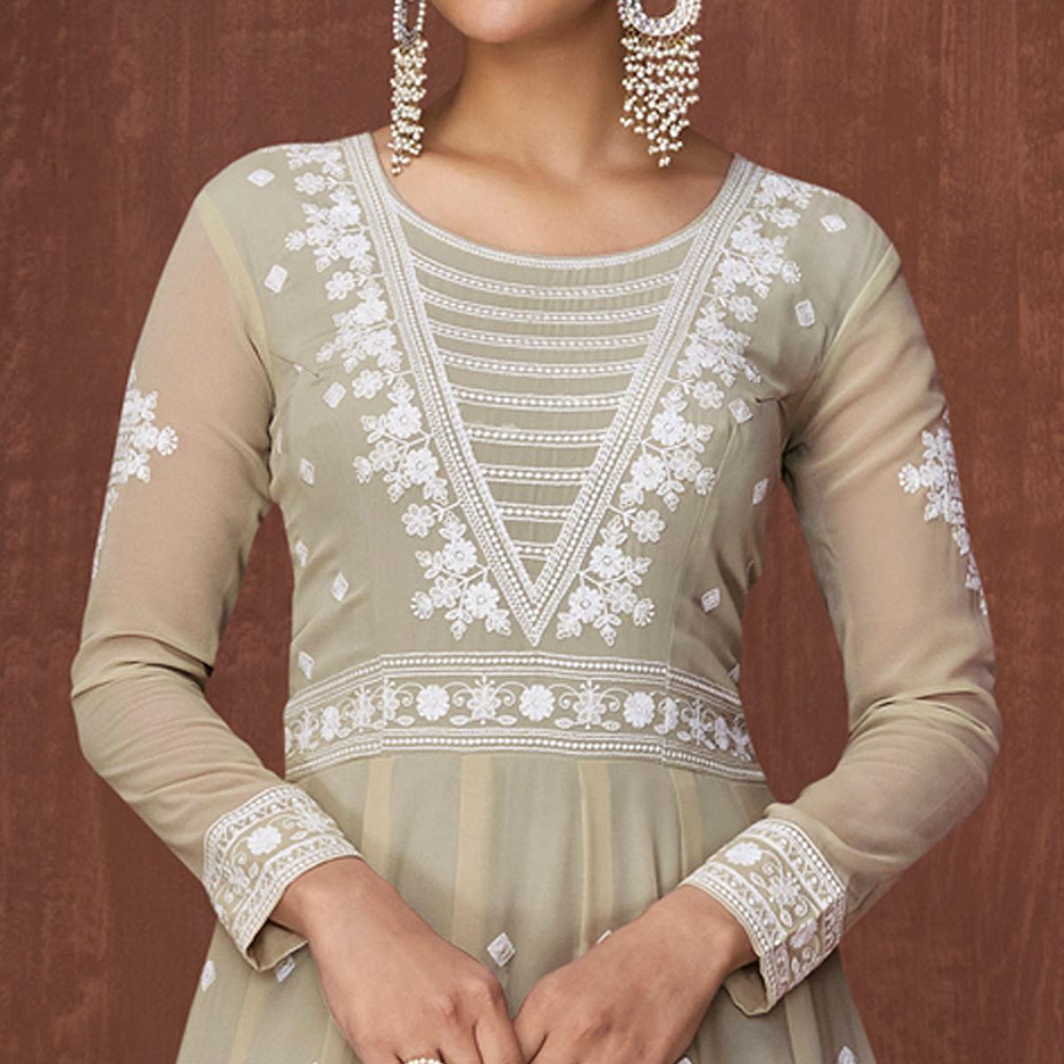 Light Olive Green Party Wear Heavy Embroidered Georgette Gown