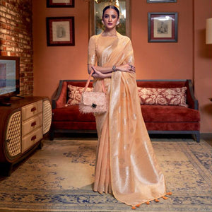 Light Orange Woven Linen Saree With Tassels