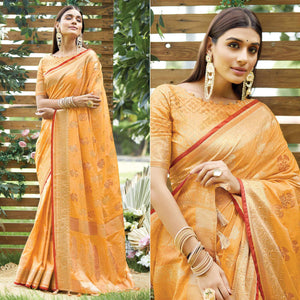 Light Orange Woven Raw Silk Saree With Tassels