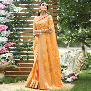 Light Orange Woven Raw Silk Saree With Tassels