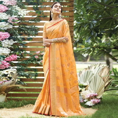 Light Orange Woven Raw Silk Saree With Tassels
