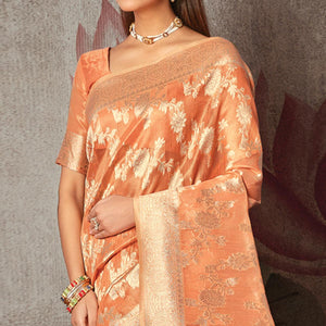 Light Peach Woven Art Silk Saree With Tassels
