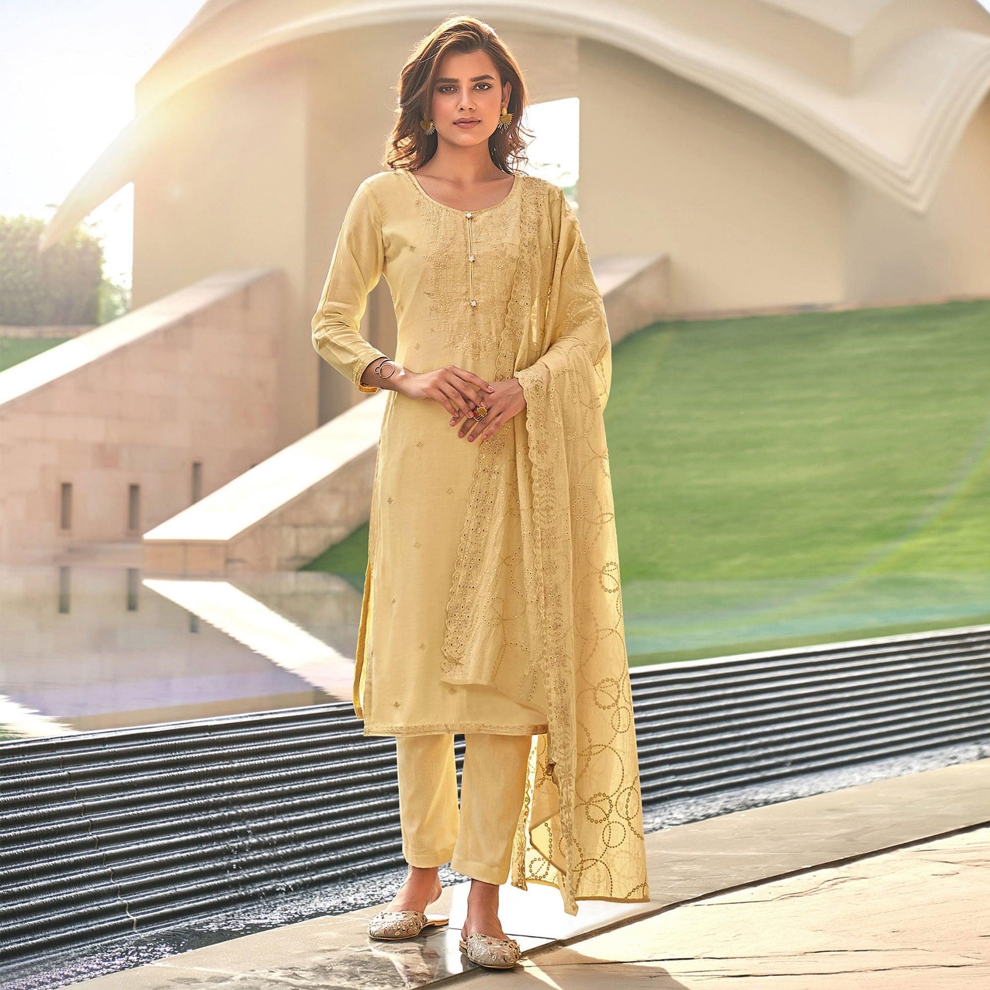Light Yellow Festive Wear Embroidered Muslin Palazzo Suit