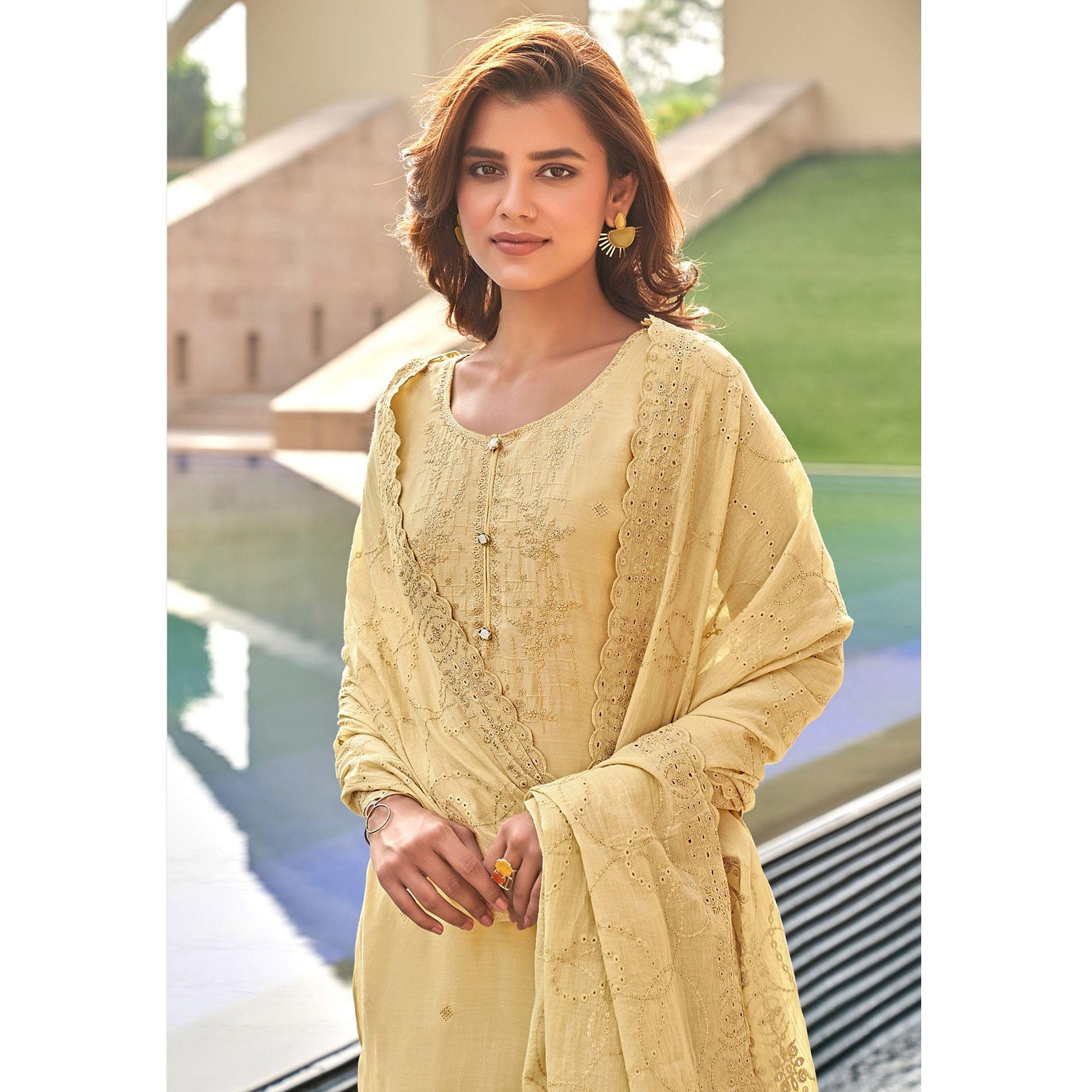 Light Yellow Festive Wear Embroidered Muslin Palazzo Suit