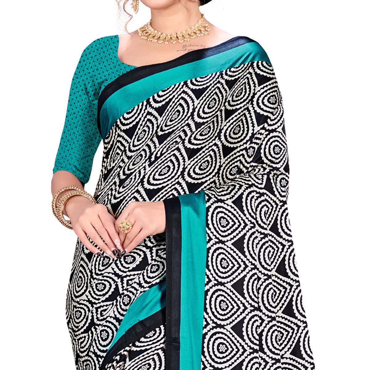 Lovely Blue-Black Colored Festive Wear Printed Satin Crepe Saree