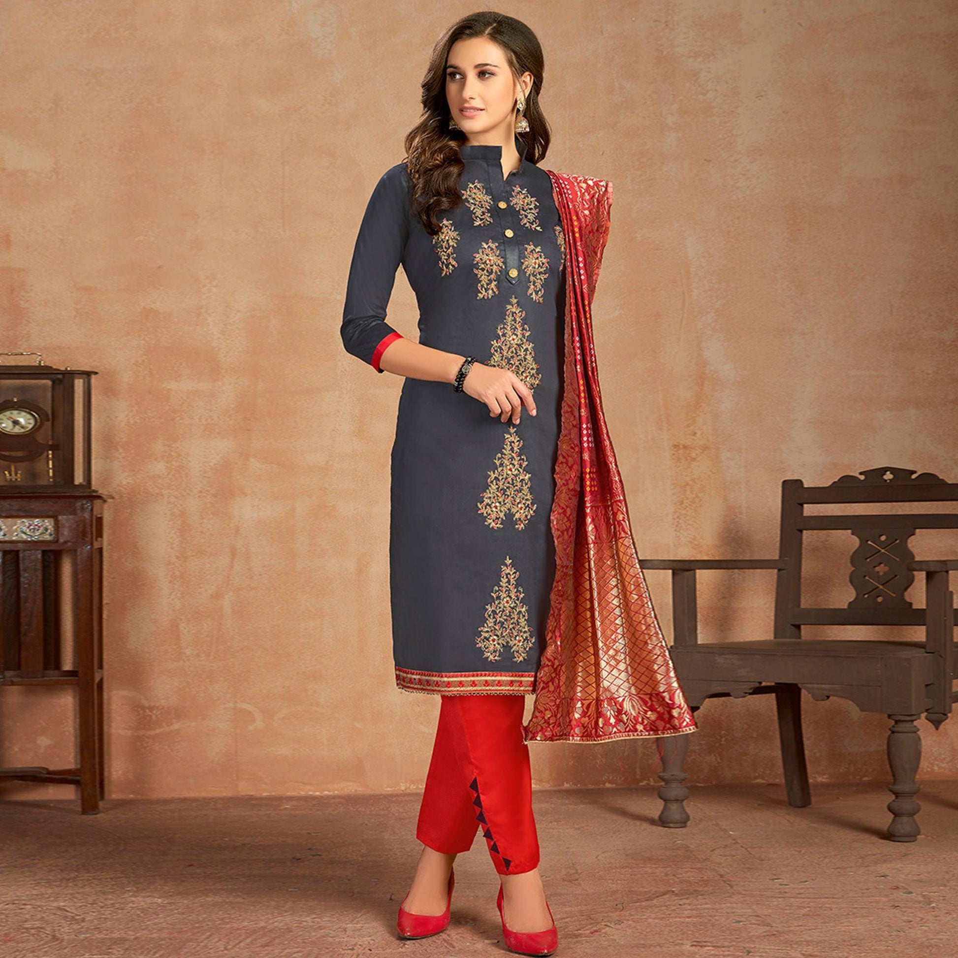Lovely Blue Colored Partywear Embroidered Pure Cotton Dress Material