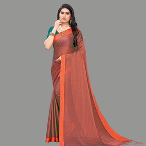 Lovely Brown Colored Party Wear Printed Poly Georgette Saree With Tassels