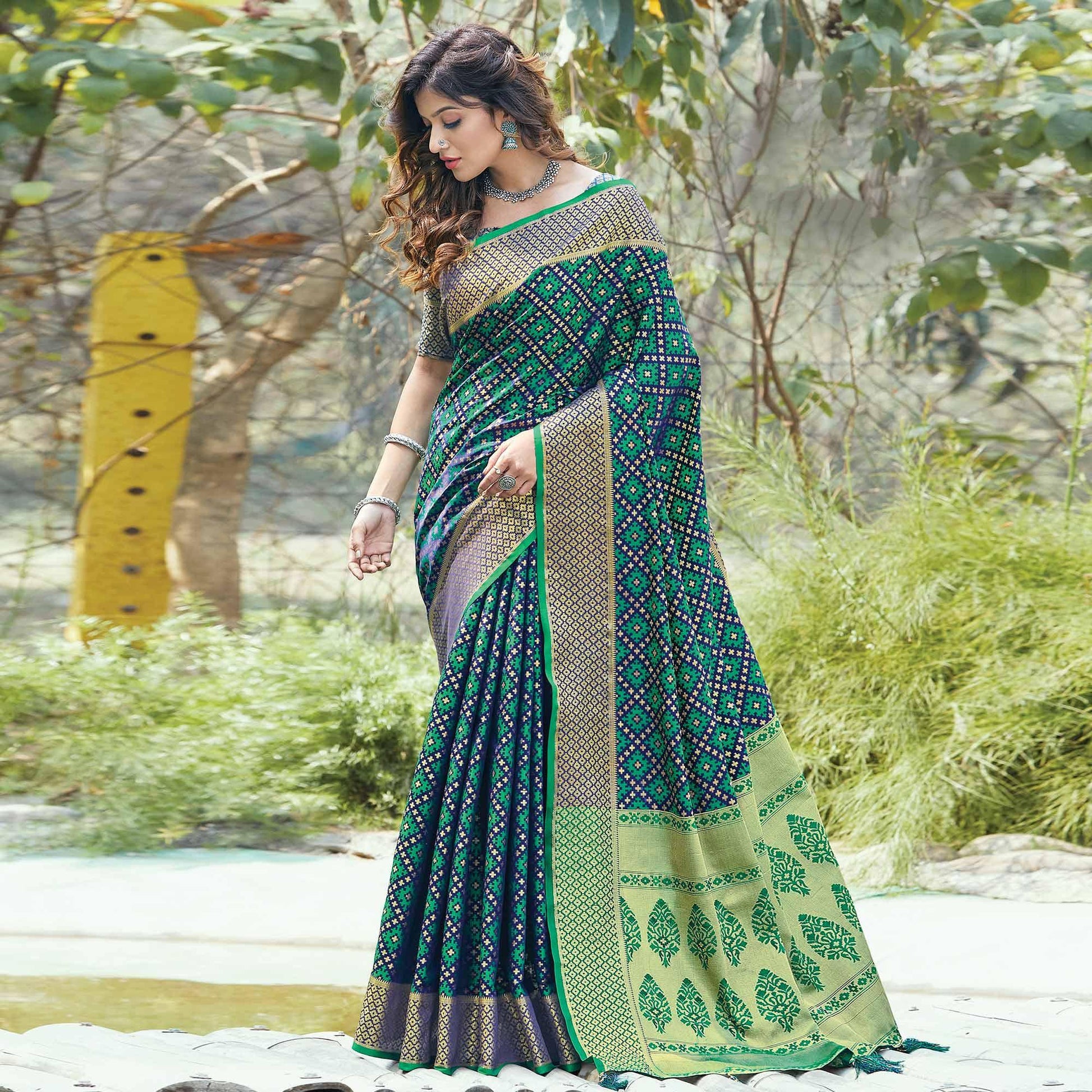 Lovely Green Colored Festive Wear Patan Patola Silk Saree