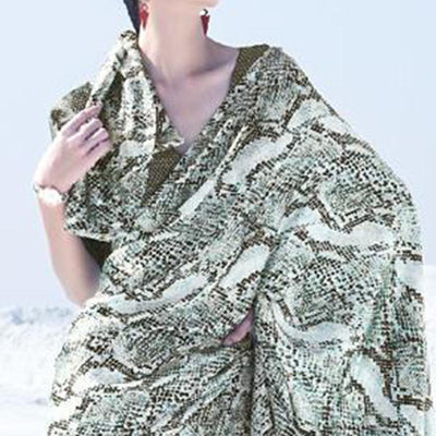 Lovely Offwhite Colored Casual Wear Printed Satin Crepe Saree