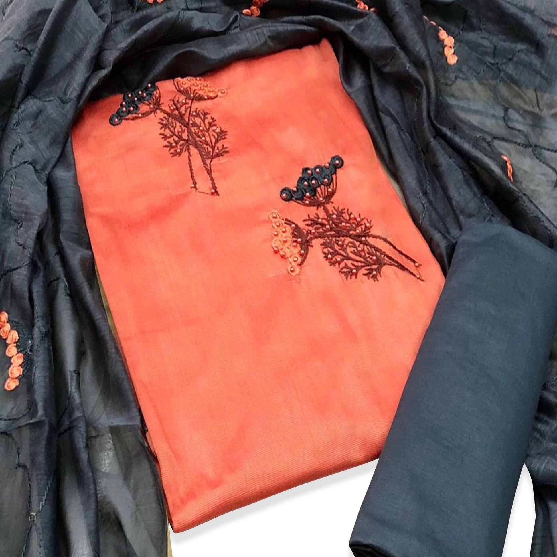 Lovely Peach Colored Casual Wear Embroidered Cotton Dress Material