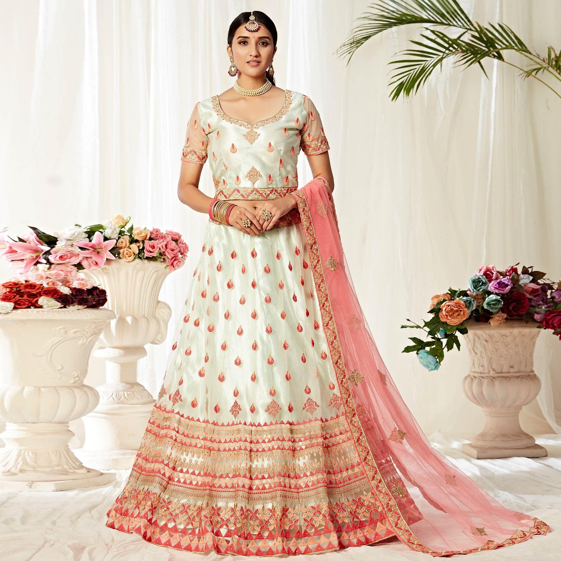 Lovely Pista Colored Wedding Wear Embroidered Heavy Net Lehenga Choli