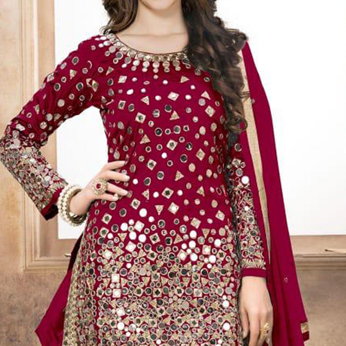 Lovely Red Colored Partywear Embroidered Tapeta Silk Patiala Suit