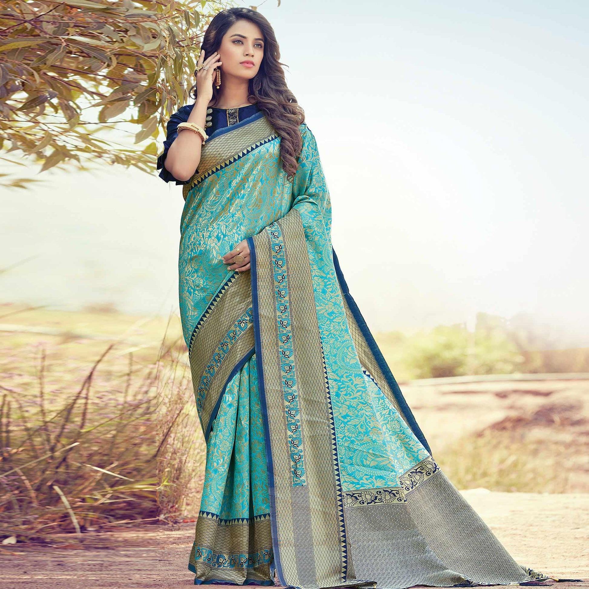 Lovely Turquoise Blue Colored Festive Wear Woven Silk Saree
