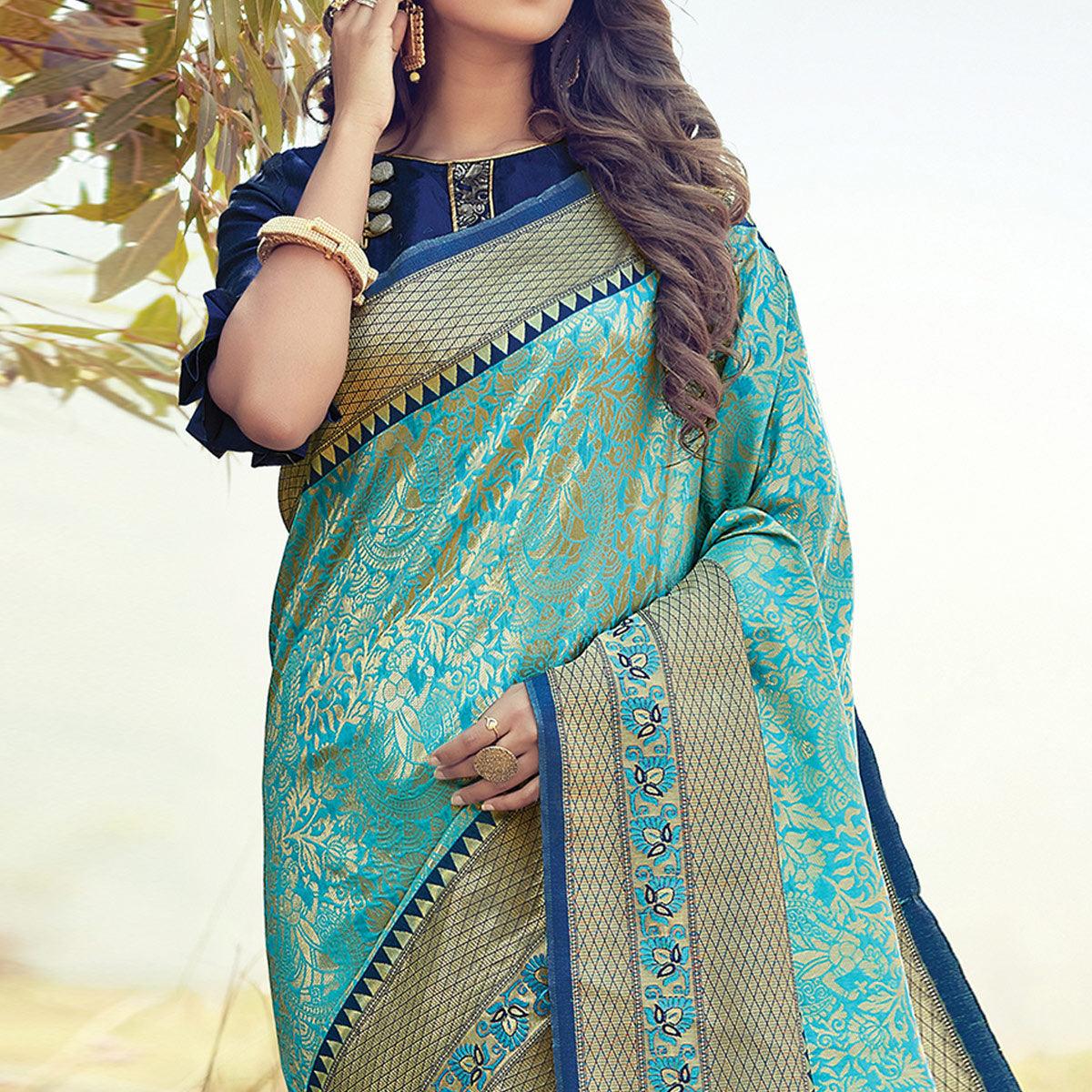 Lovely Turquoise Blue Colored Festive Wear Woven Silk Saree