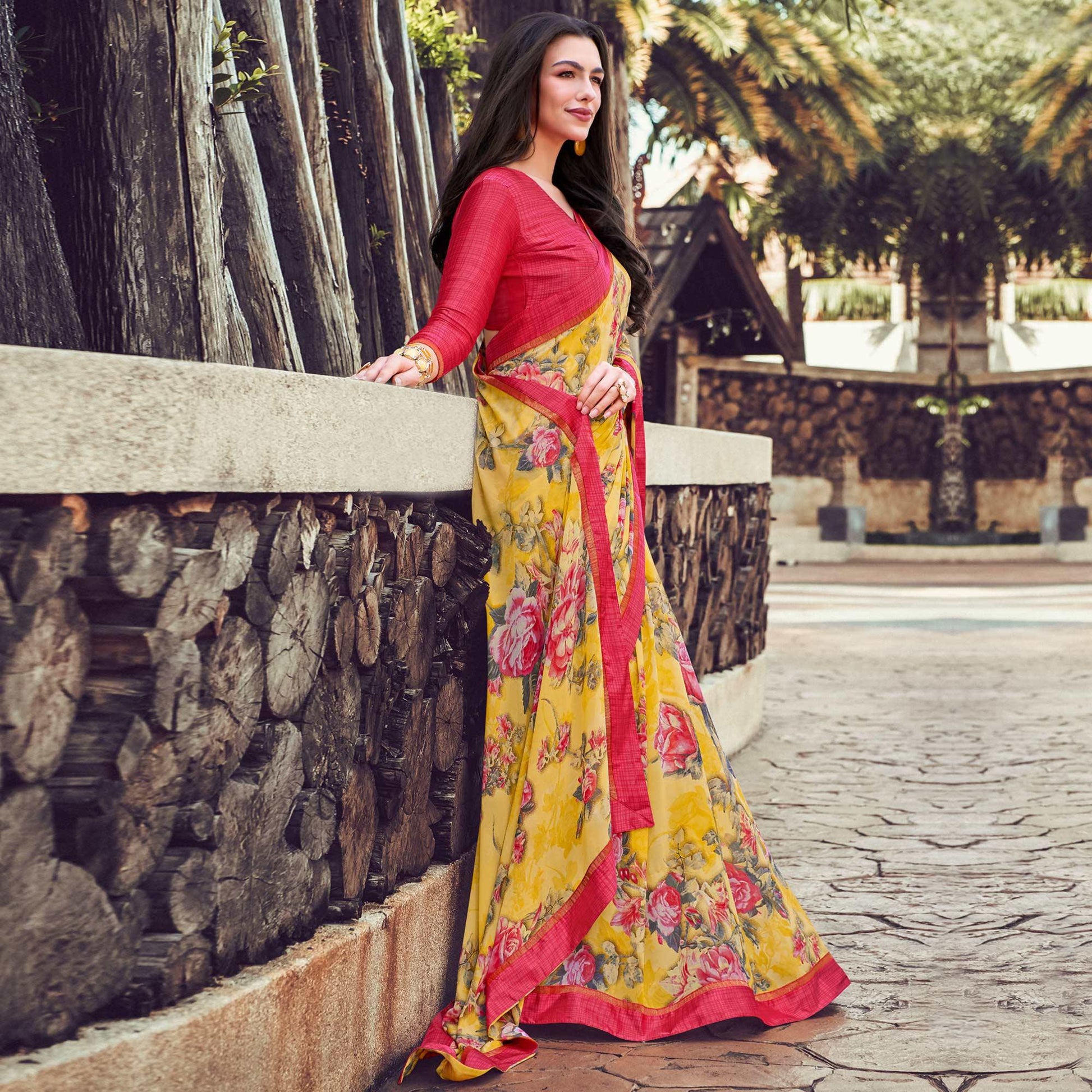 Lovely Yellow Colored Partywear Designer Printed Georgette Saree