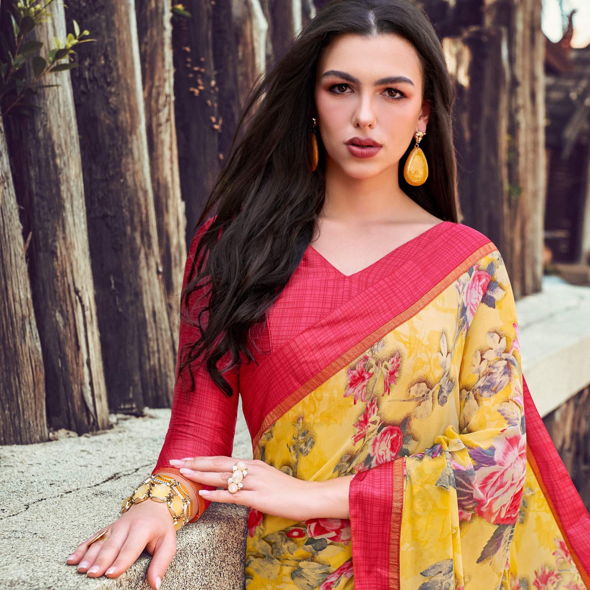 Lovely Yellow Colored Partywear Designer Printed Georgette Saree