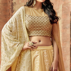 Magnetic Beige Colored Partywear Embroidered Silk Lehenga Choli