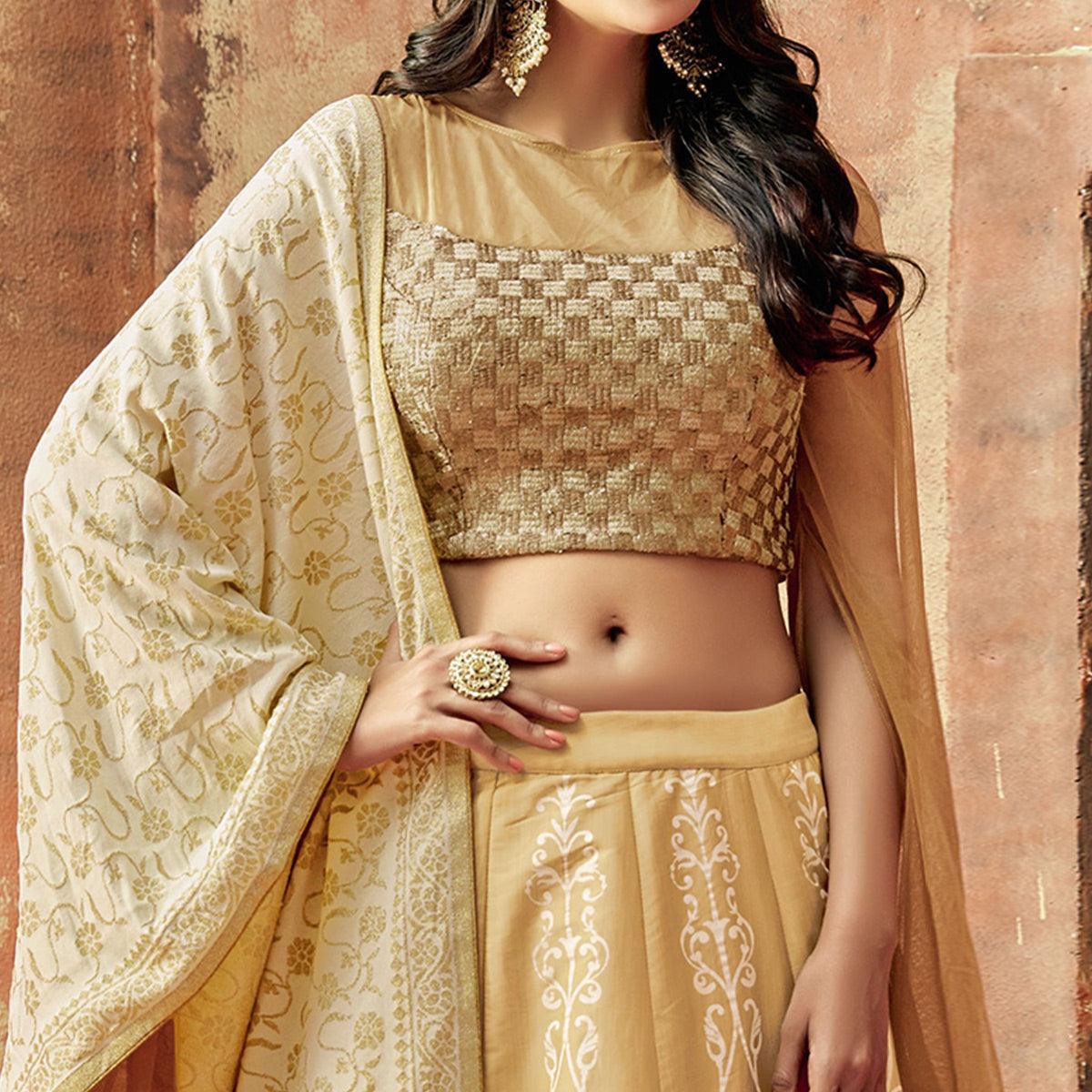 Magnetic Beige Colored Partywear Embroidered Silk Lehenga Choli
