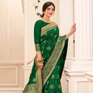 Magnetic Green Colored Festive Wear Woven Banarasi Silk Saree