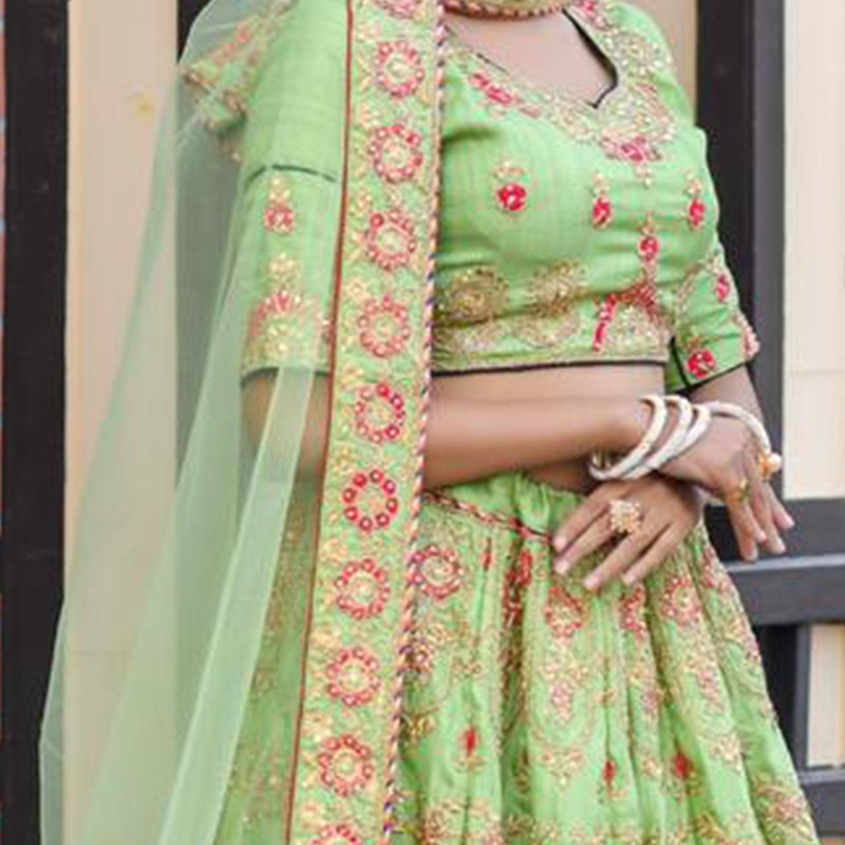 Magnetic Green Colored Party Wear Embroidered Silk Lehenga Choli