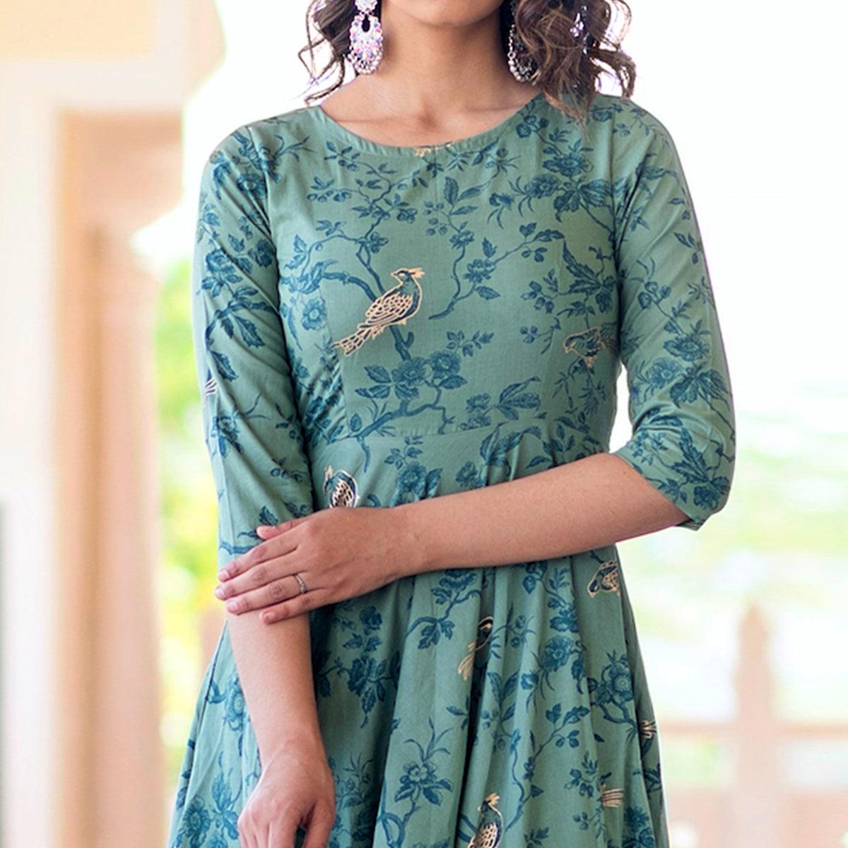 Magnetic Light Aqua Colored Partywear Printed Muslin Blend Long Kurti