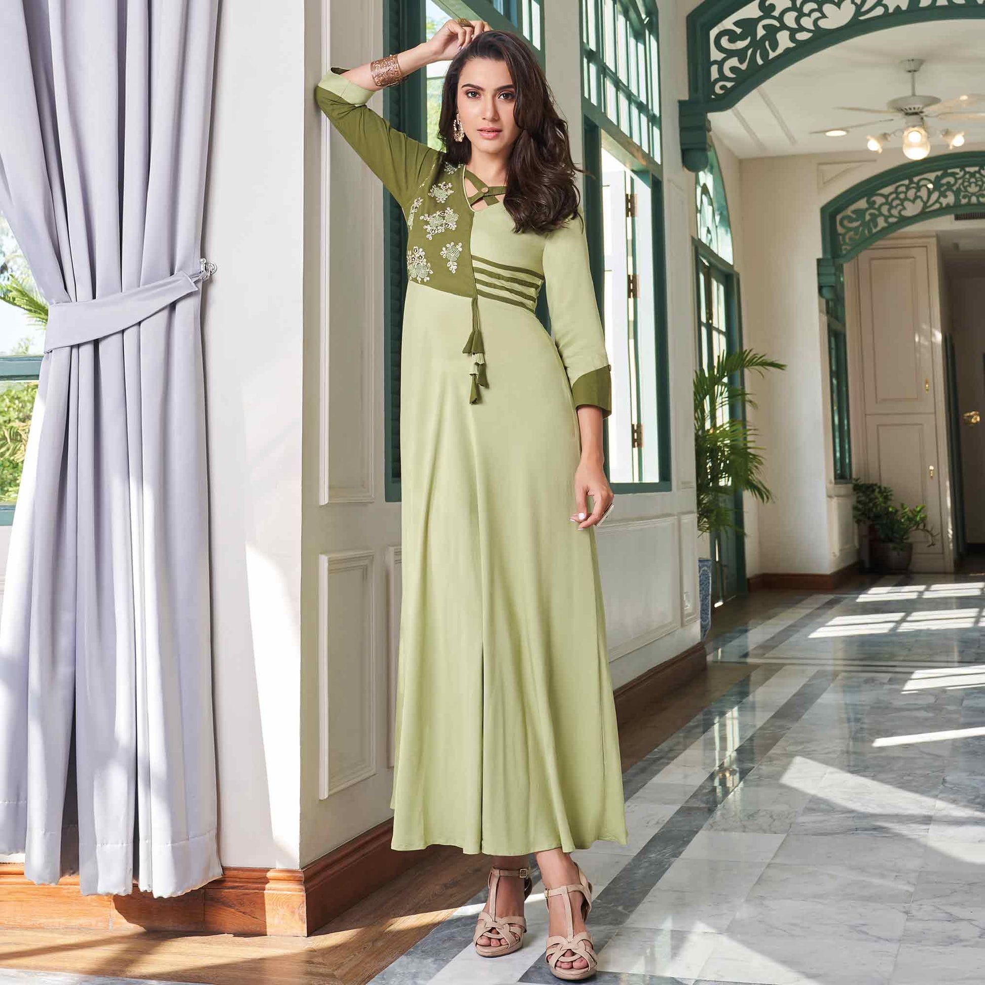 Magnetic Light Olive Green Colored Party Wear Embroidered Rayon Long Kurti