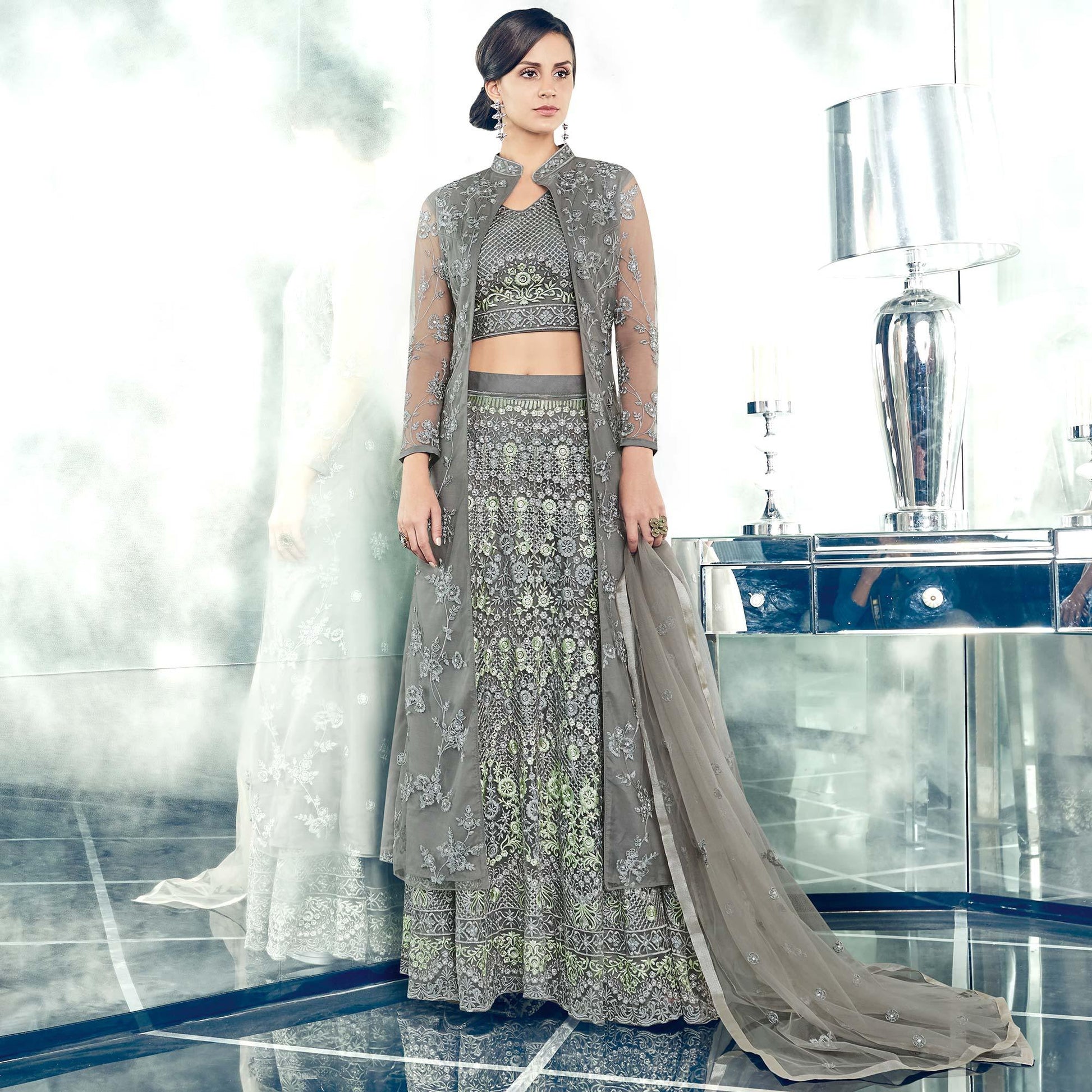 Majestic Gray Colored Partywear Designer Embroidered Net Anarkali Suit
