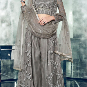 Majestic Gray Colored Partywear Designer Embroidered Net Anarkali Suit