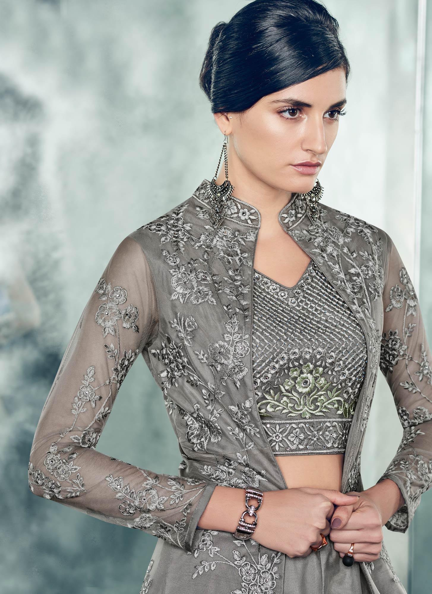 Majestic Gray Colored Partywear Designer Embroidered Net Anarkali Suit