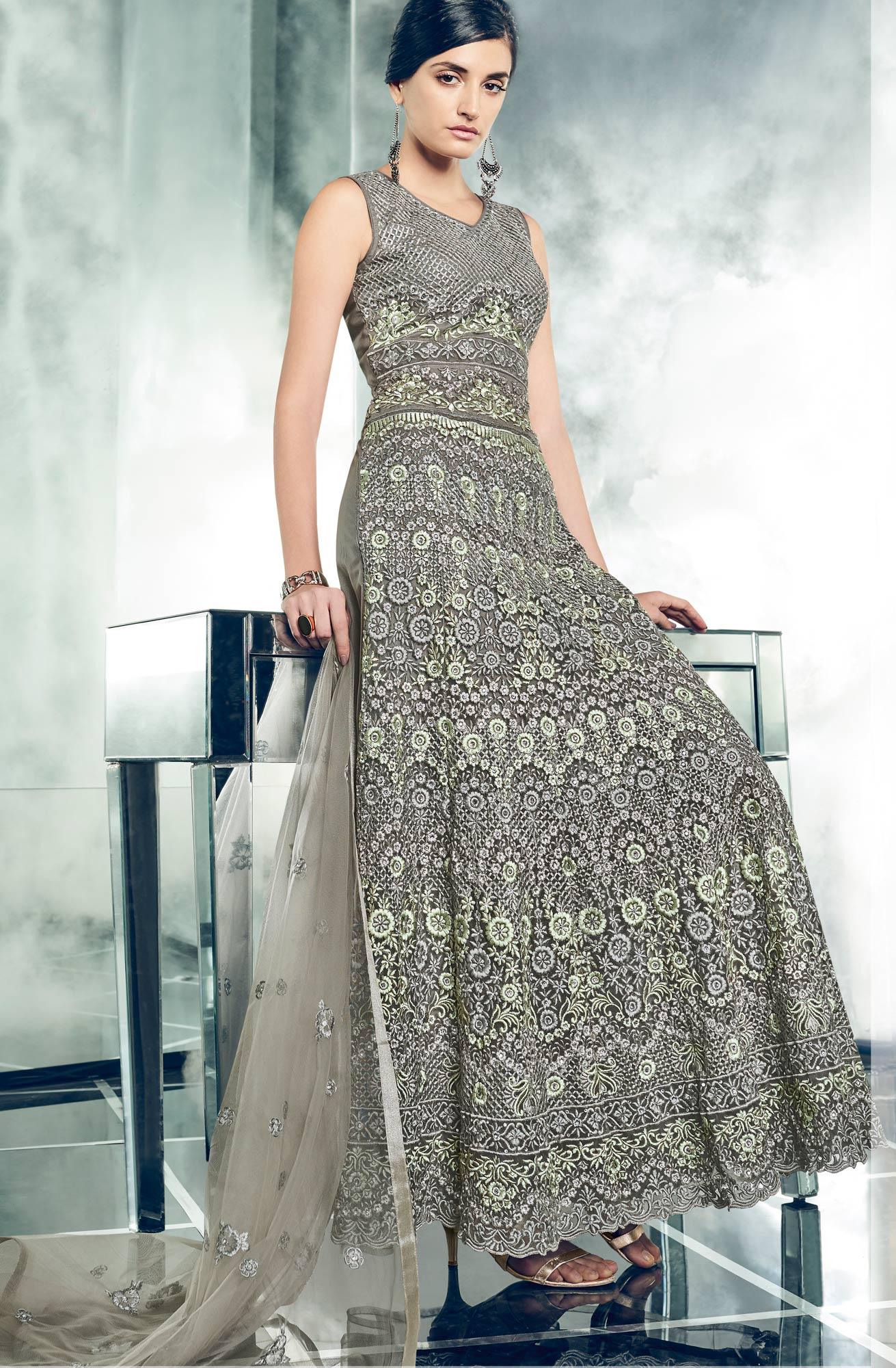 Majestic Gray Colored Partywear Designer Embroidered Net Anarkali Suit