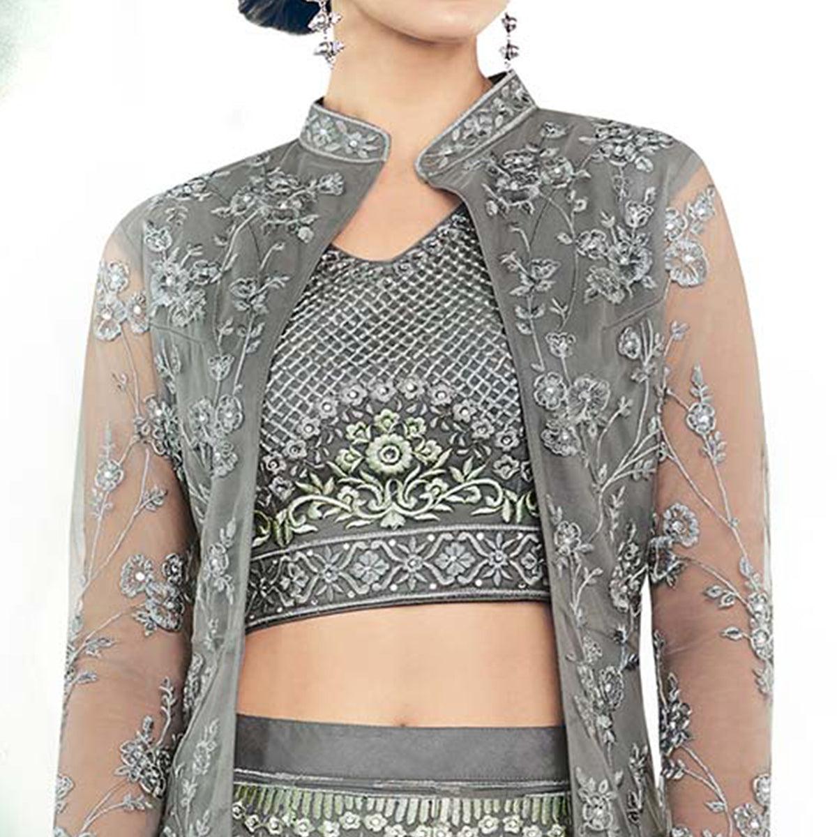 Majestic Gray Colored Partywear Designer Embroidered Net Anarkali Suit