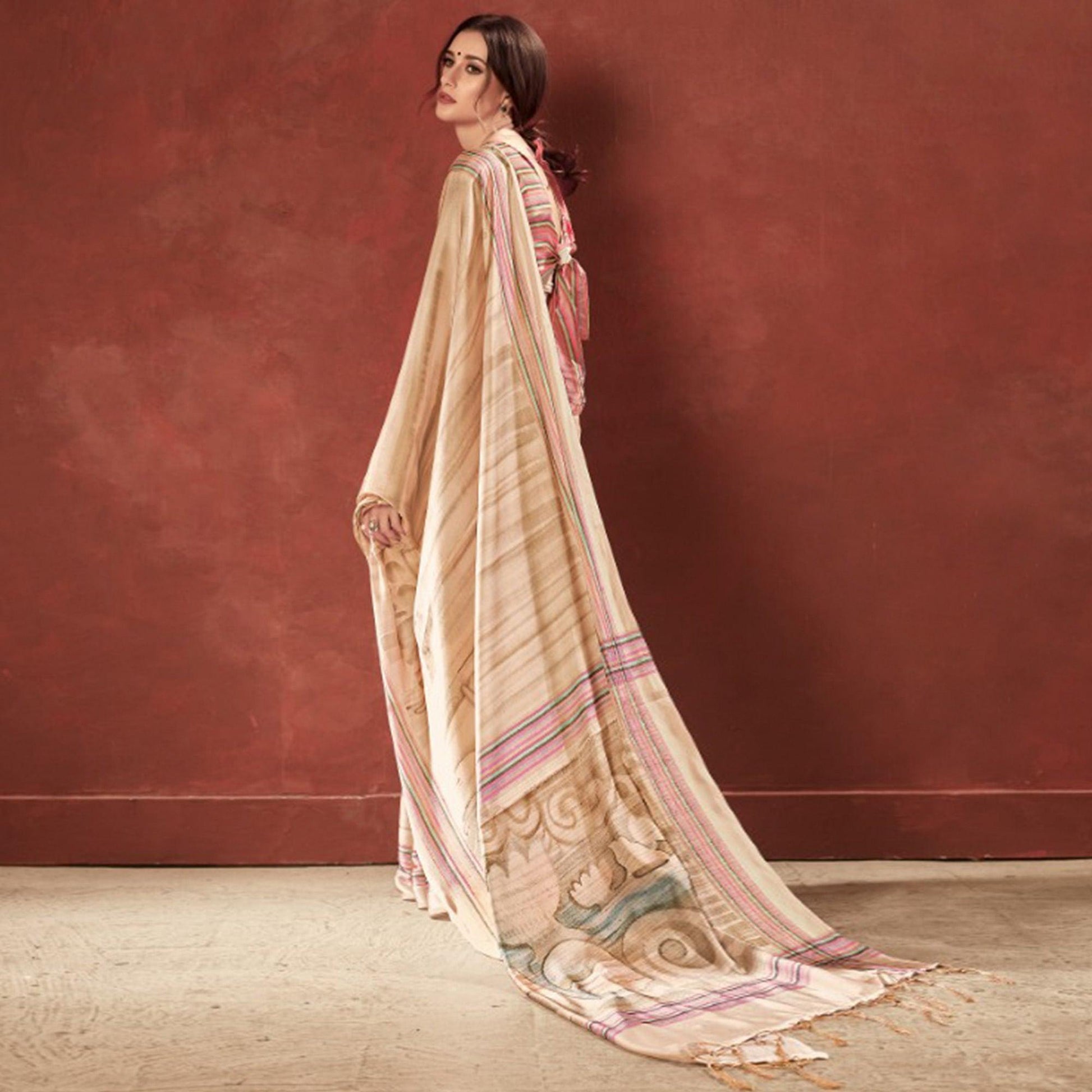 Majesty Cream Colored Casual Wear Printed Satin Crepe Saree With Tassels