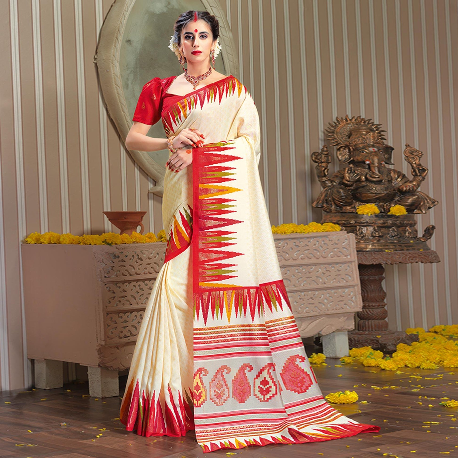 Majesty Cream Colored Festive Wear Patola Silk saree