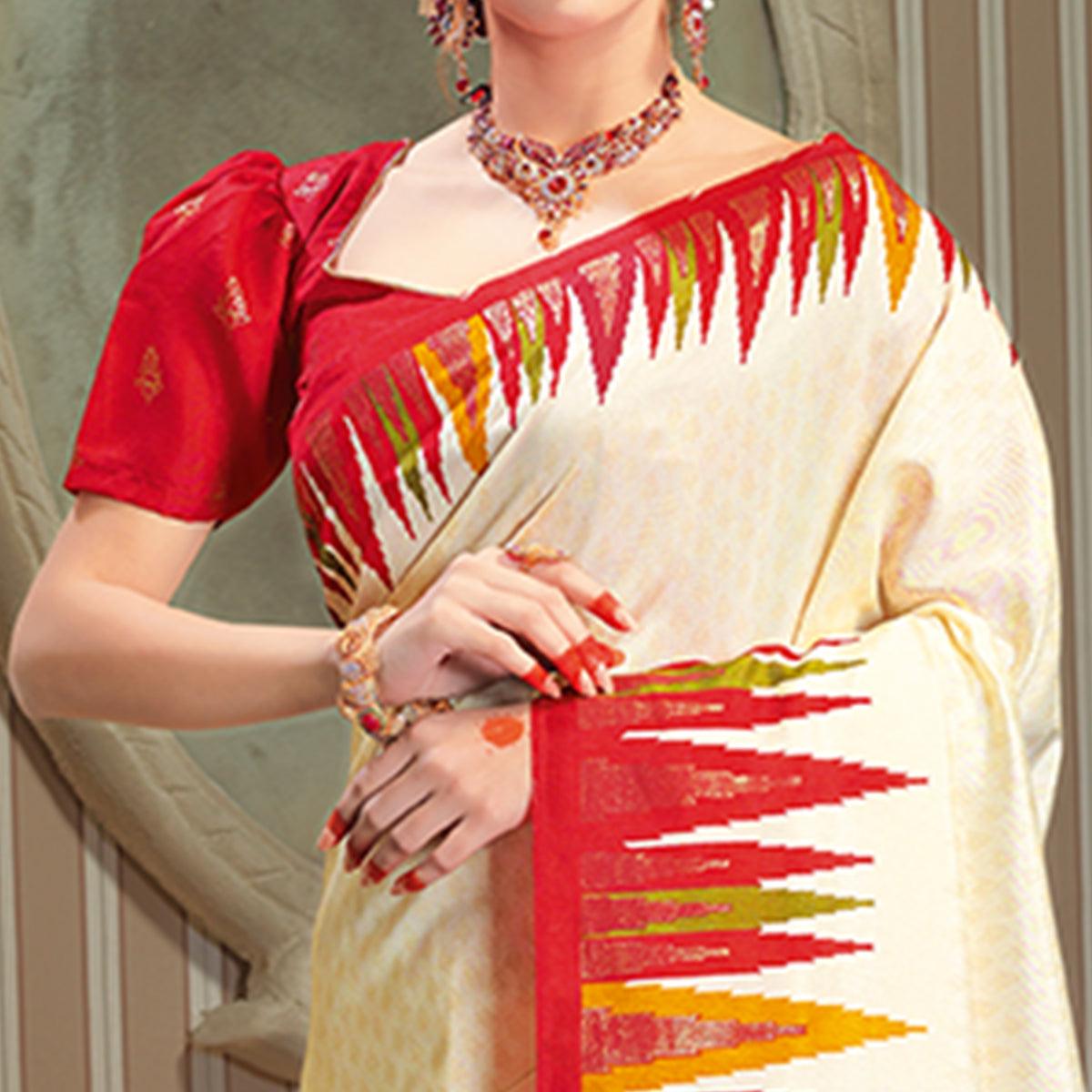 Majesty Cream Colored Festive Wear Patola Silk saree