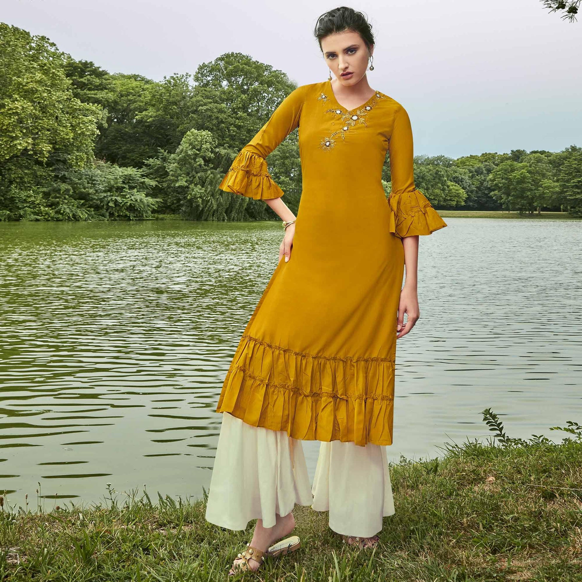 Majesty Mustard Yellow Colored Partywear Hand Embroidered Muslin Silk Kurti-Palazzo Set