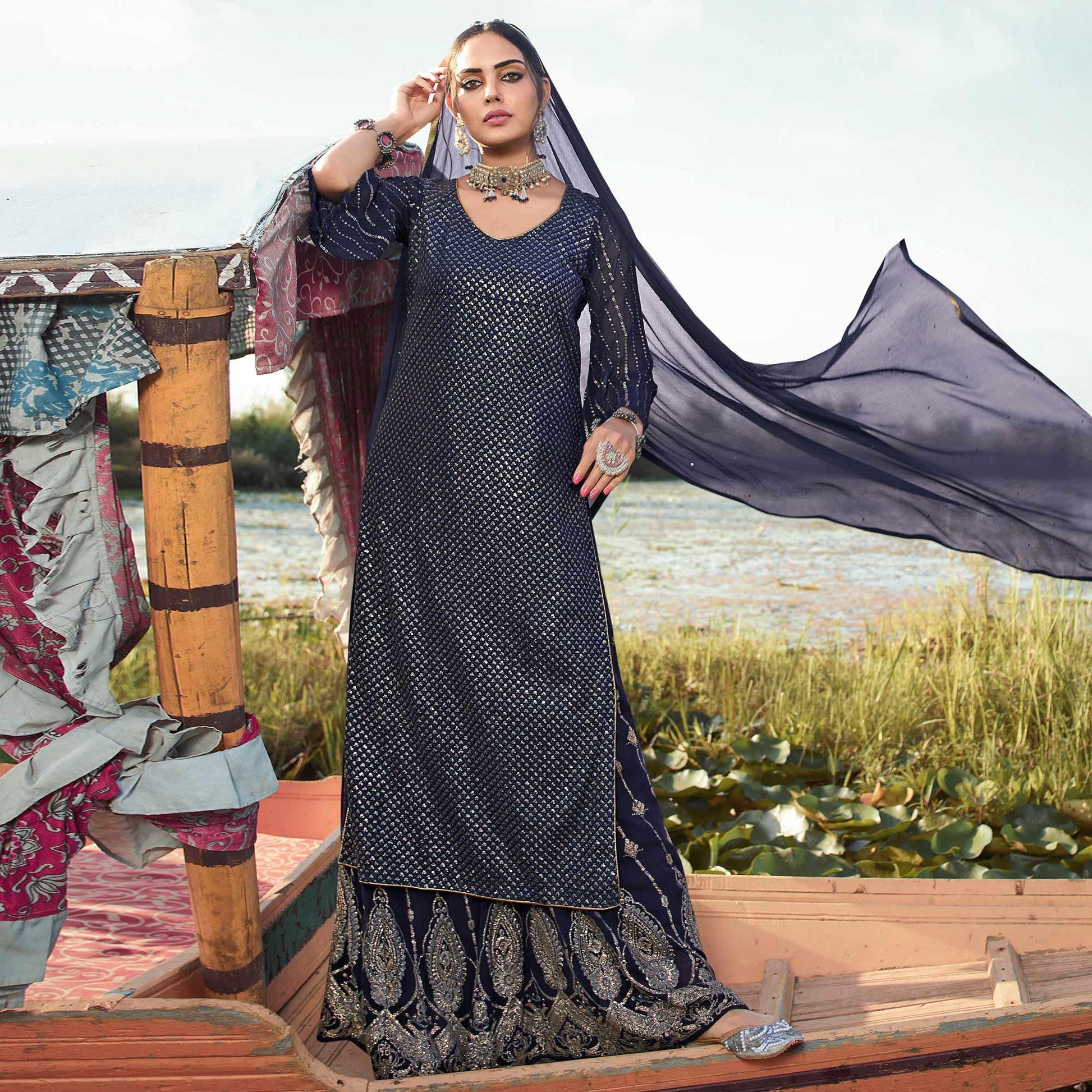 Majesty Navy Blue Colored Embroidered Partywear Heavy Georgette Suit