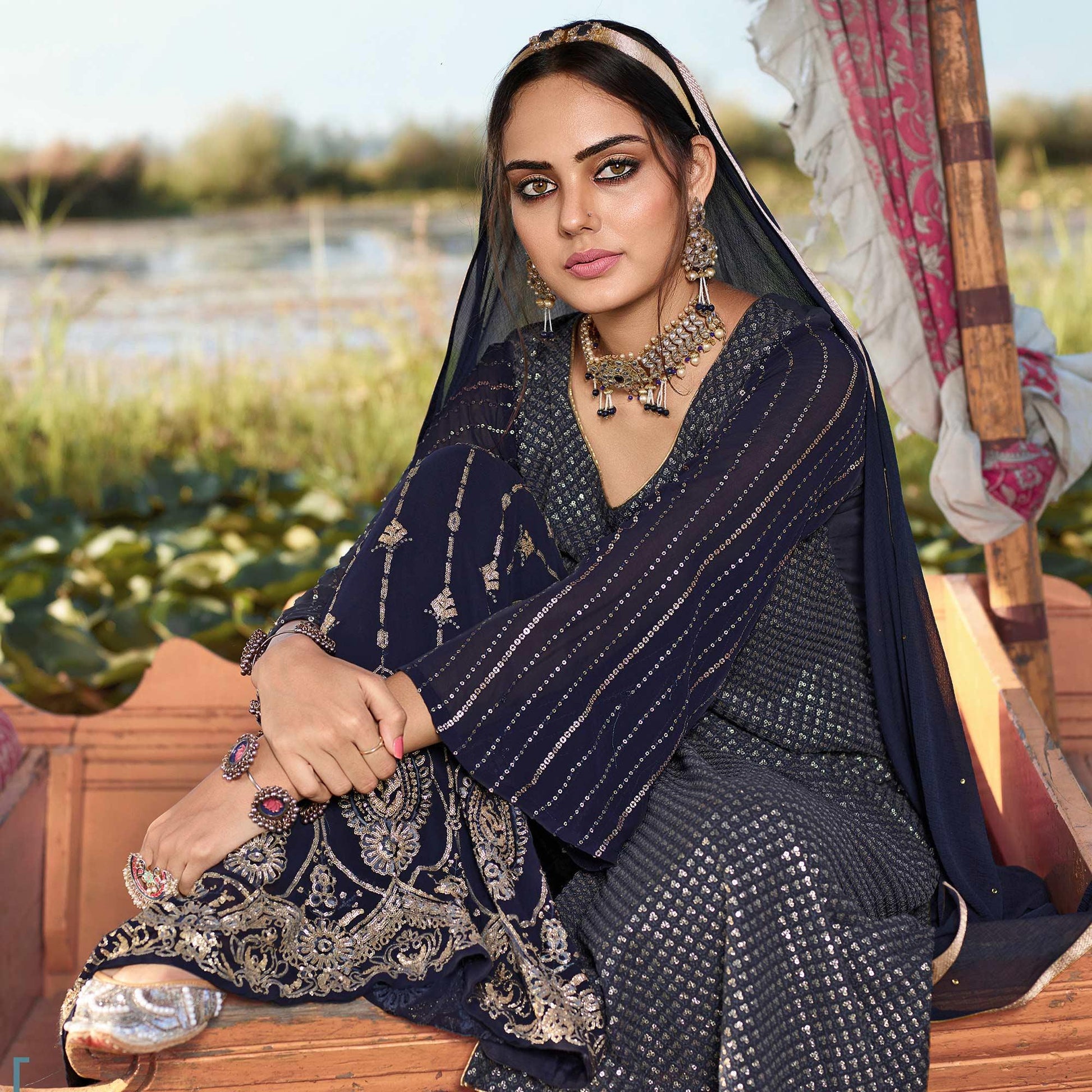 Majesty Navy Blue Colored Embroidered Partywear Heavy Georgette Suit