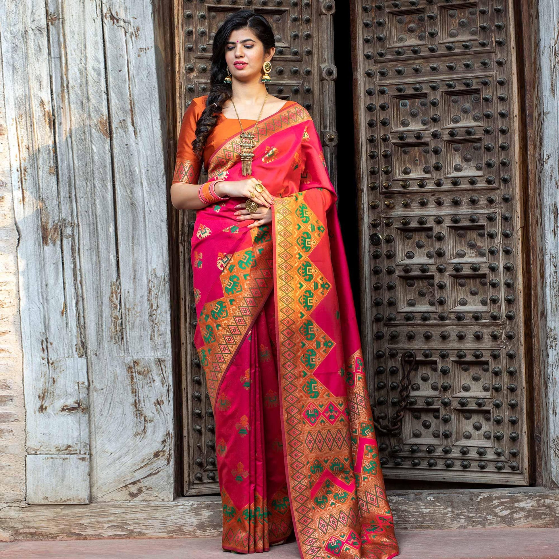 Majesty Pink Colored Festive Wear Woven Patola Silk Saree