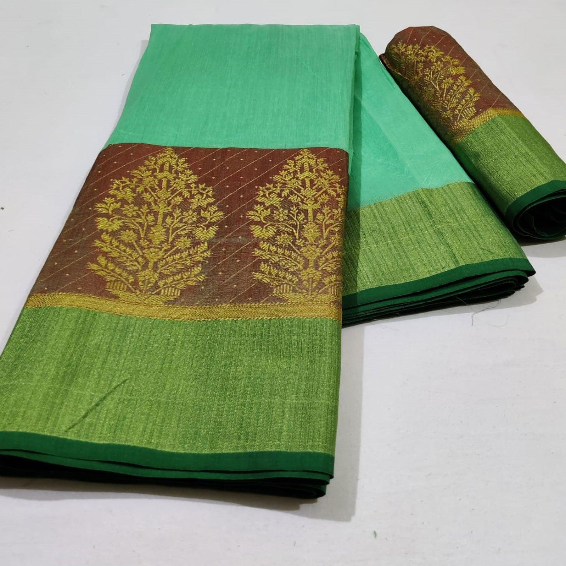 Majesty Pista Green Colored Festive Wear Woven Silk Saree