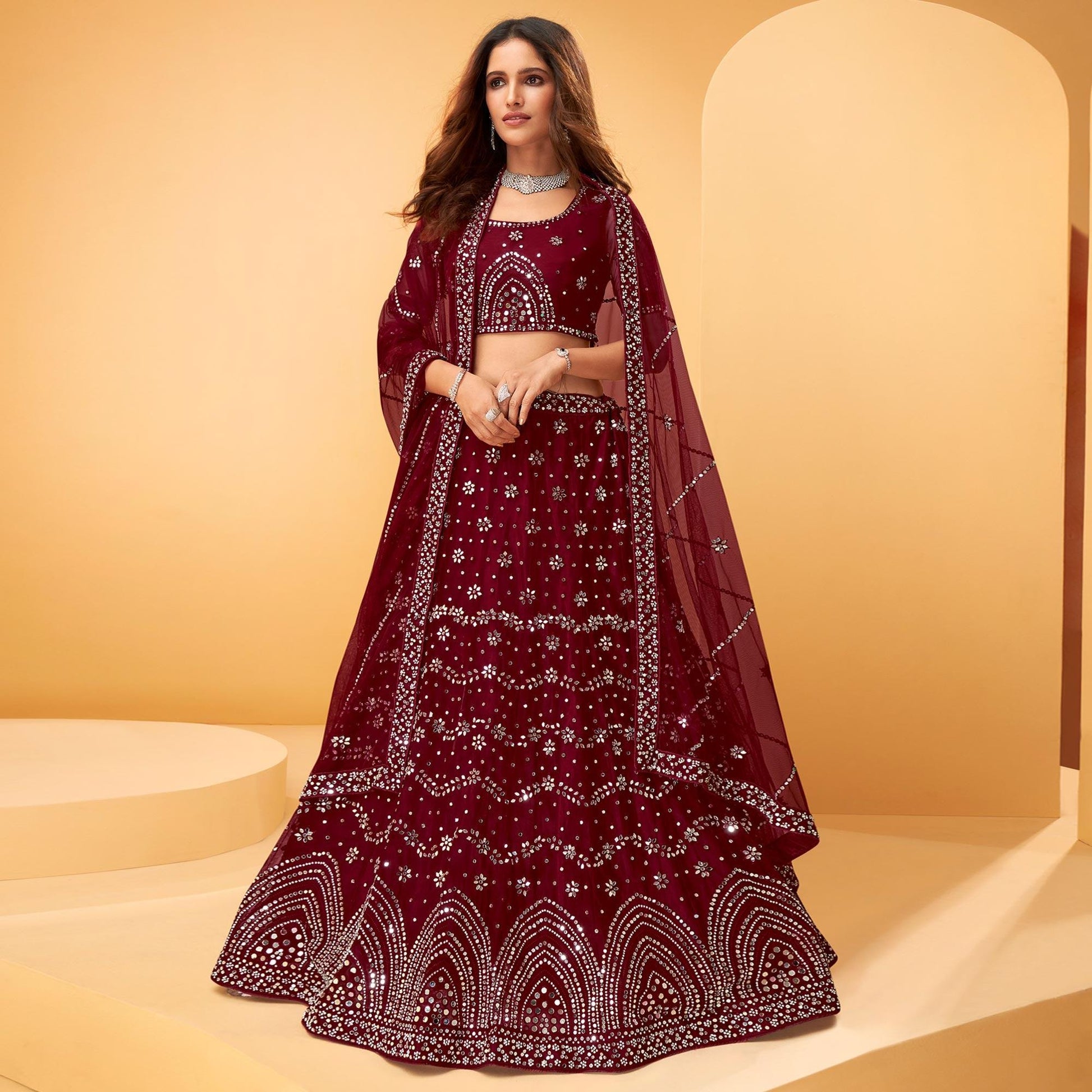 Maroon Party Wear Embroidered-Embellished Netted Lehenga Choli