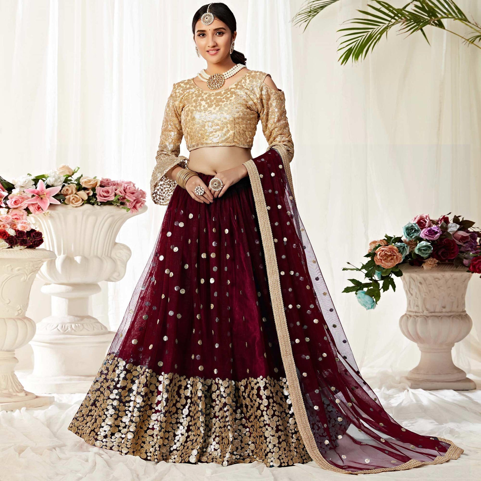 Maroon Partywear Sequined Embroidered Net Lehenga Choli