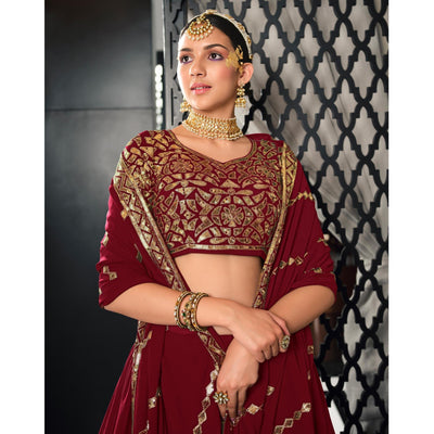 Maroon Sequins Embroidered Georgette Lehenga Choli