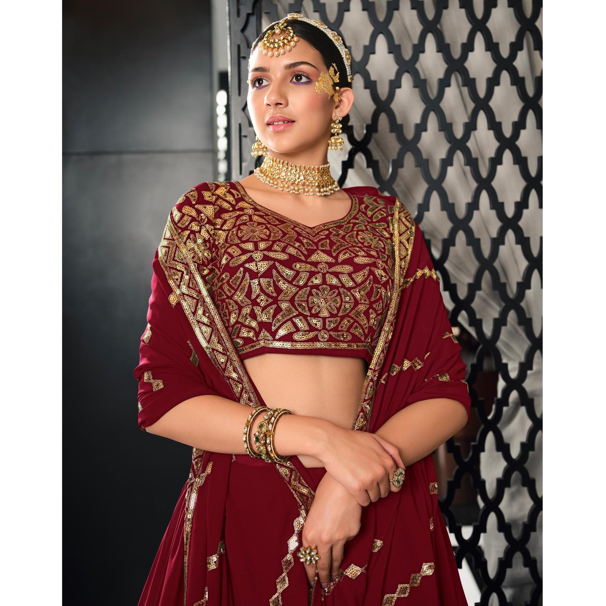 Maroon Sequins Embroidered Georgette Lehenga Choli