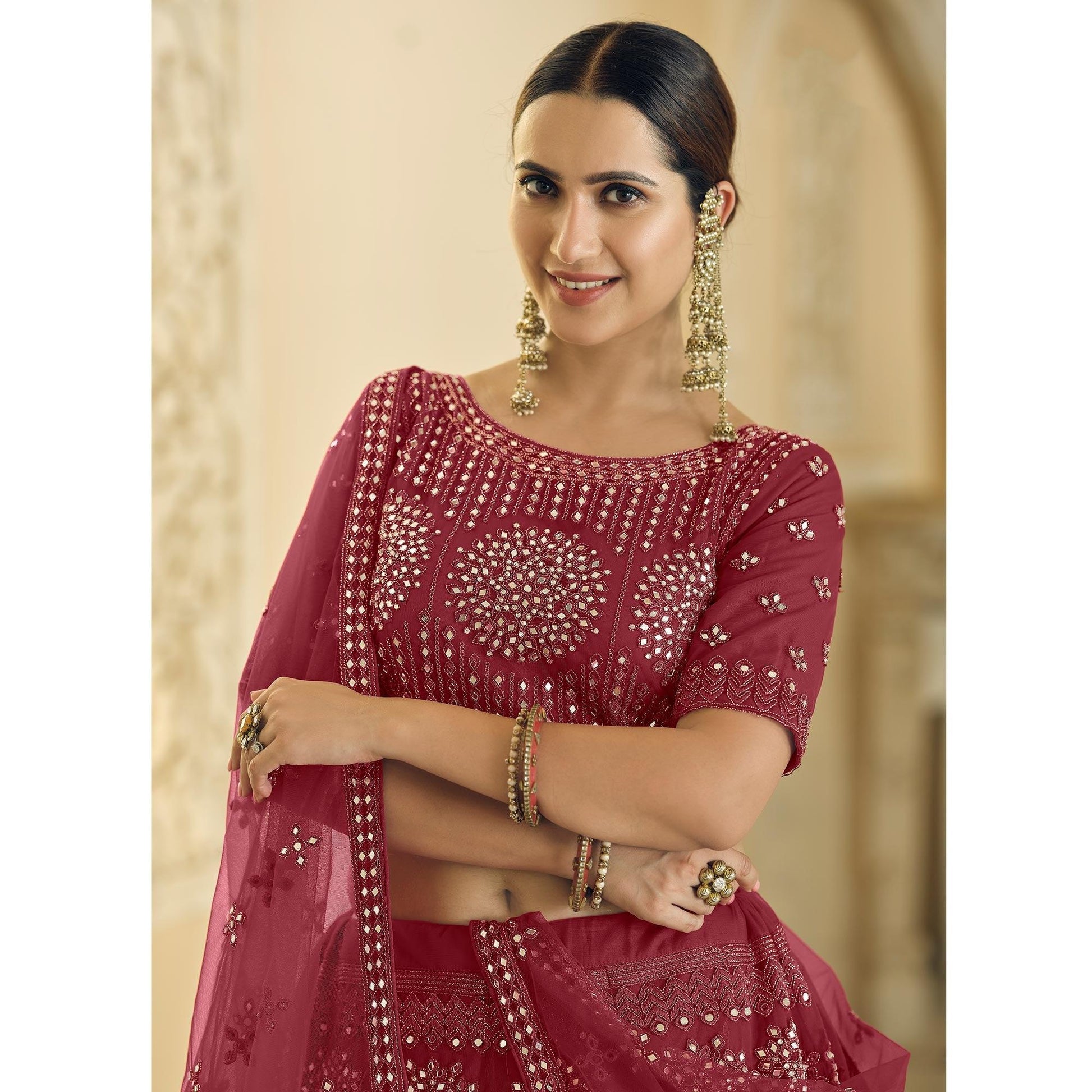 Maroon Wedding Wear Embellished Netted Lehenga Choli