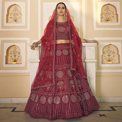 Maroon Wedding Wear Embellished Netted Lehenga Choli