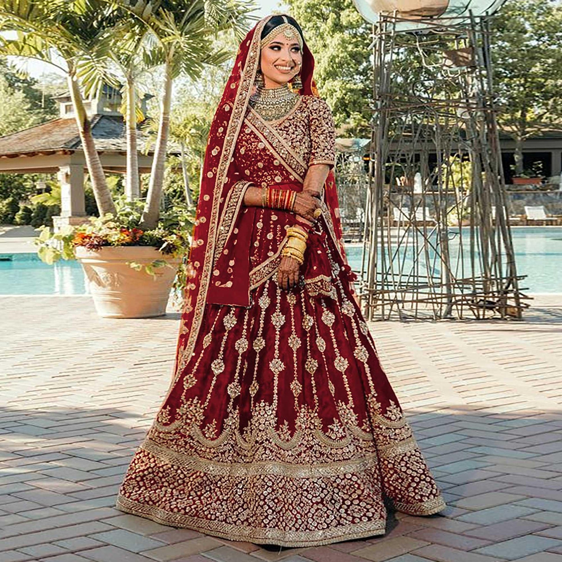 Maroon Wedding Wear Embroidered With Embellished Velvet Lehenga Choli