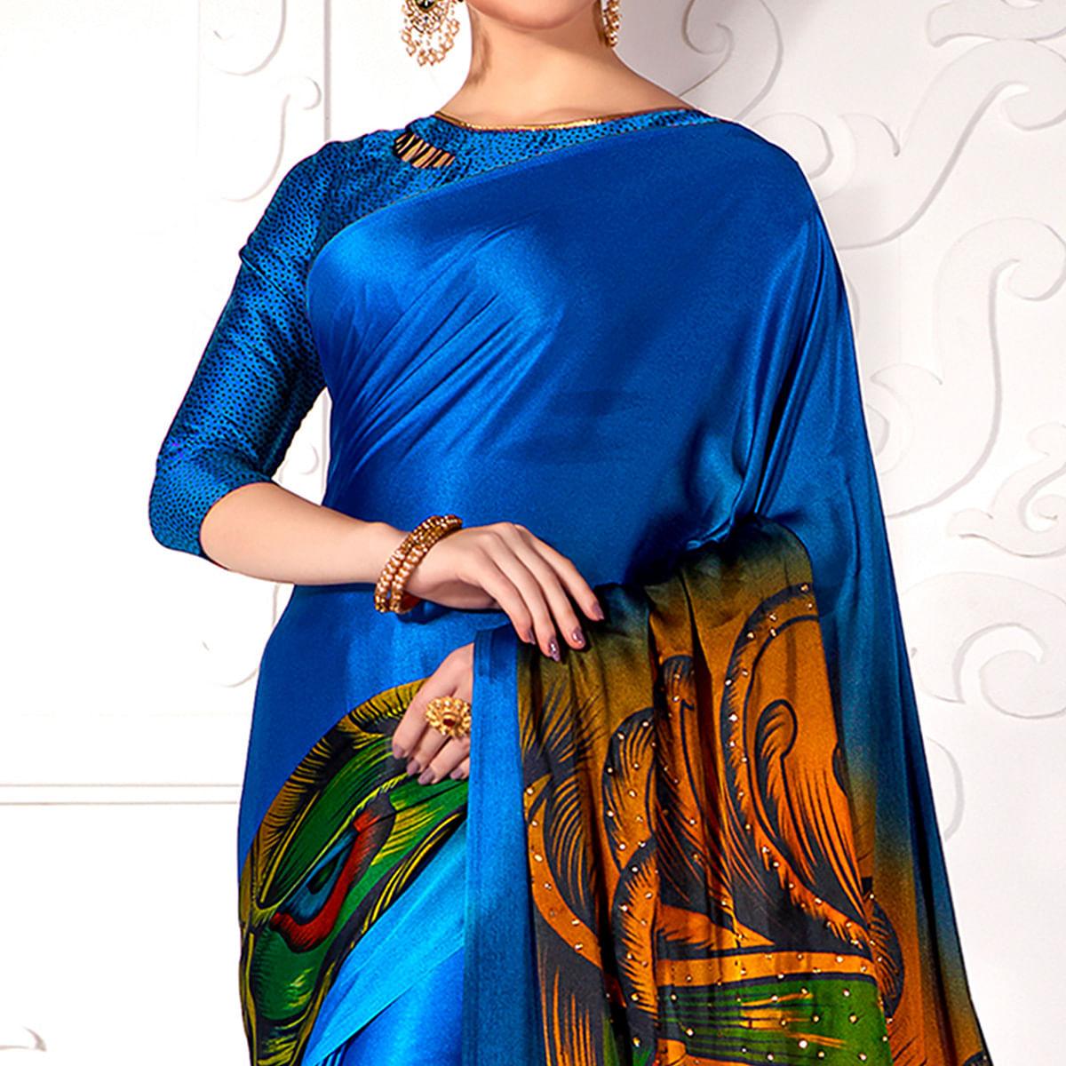 Marvellous Blue Colored Partywear Peacock Feather Printed Satin Saree