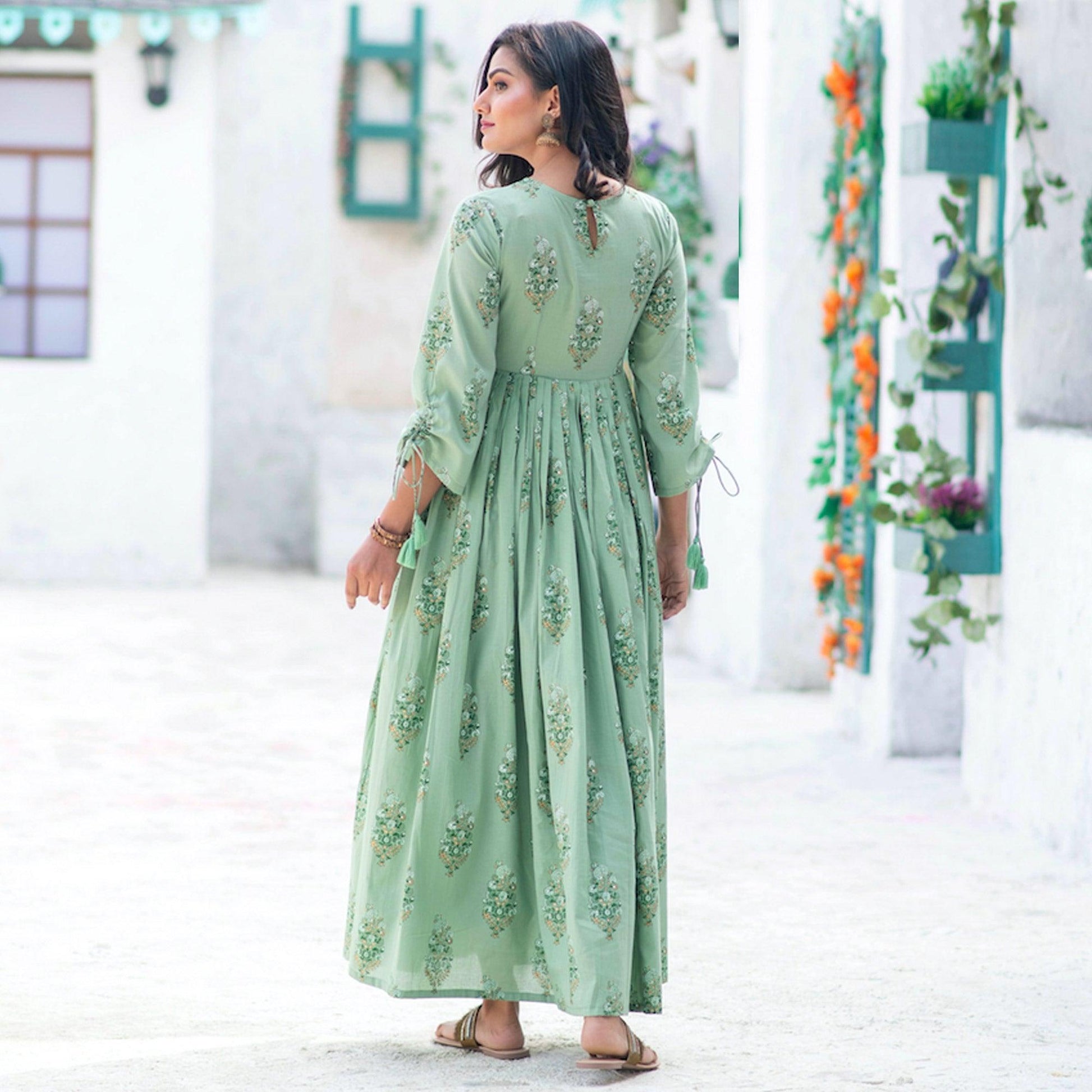Marvellous Moss Green Colored Partywear Digital Printed Pure Muslin Gown
