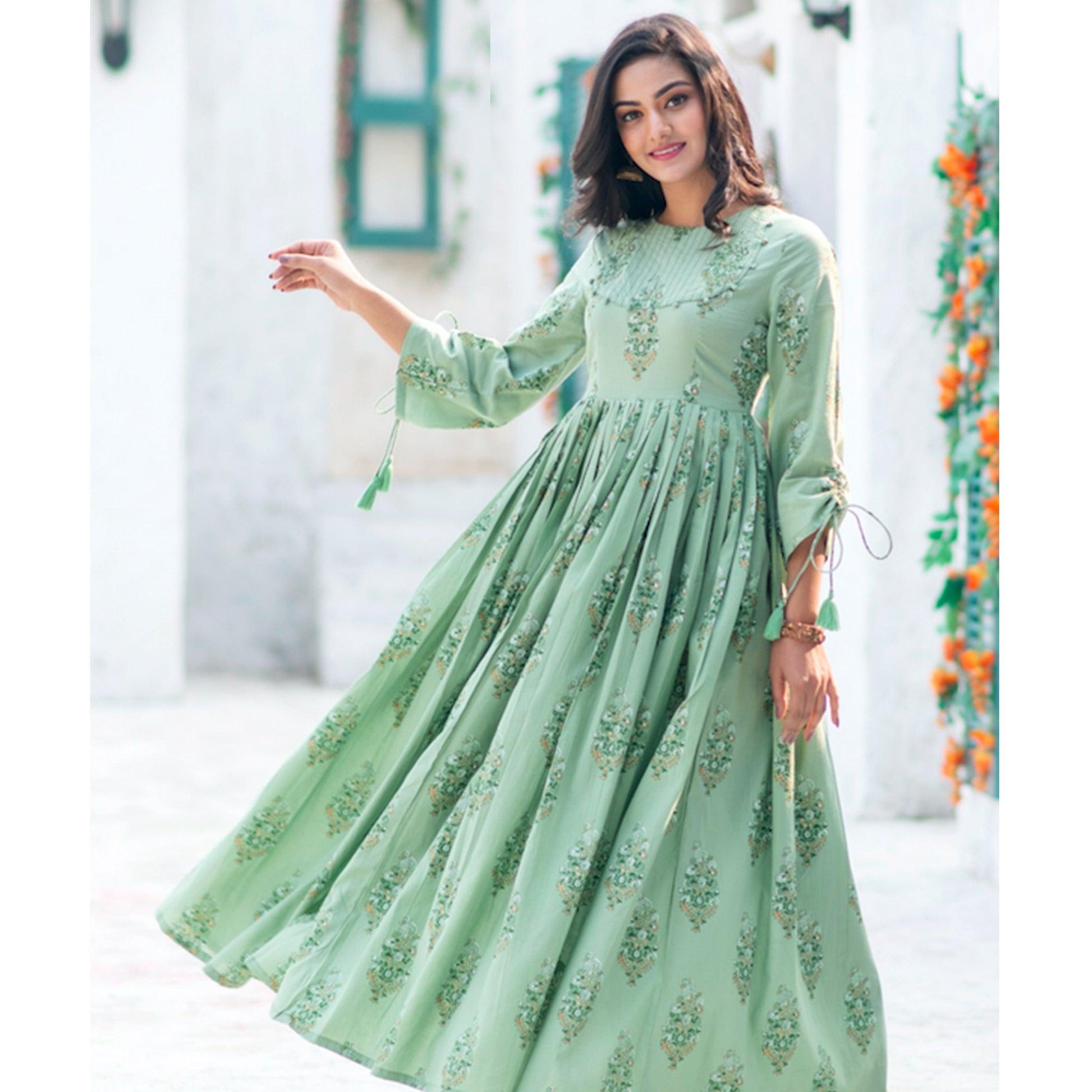 Marvellous Moss Green Colored Partywear Digital Printed Pure Muslin Gown