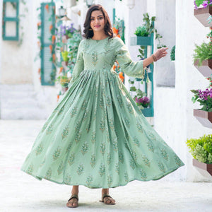 Marvellous Moss Green Colored Partywear Digital Printed Pure Muslin Gown